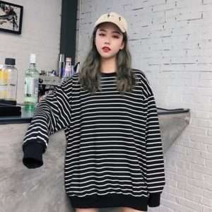 a striped oversized sweater